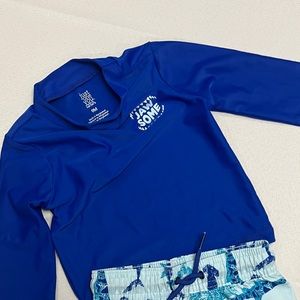 Swim suit top and shorts. Size 9 months. New without tags.